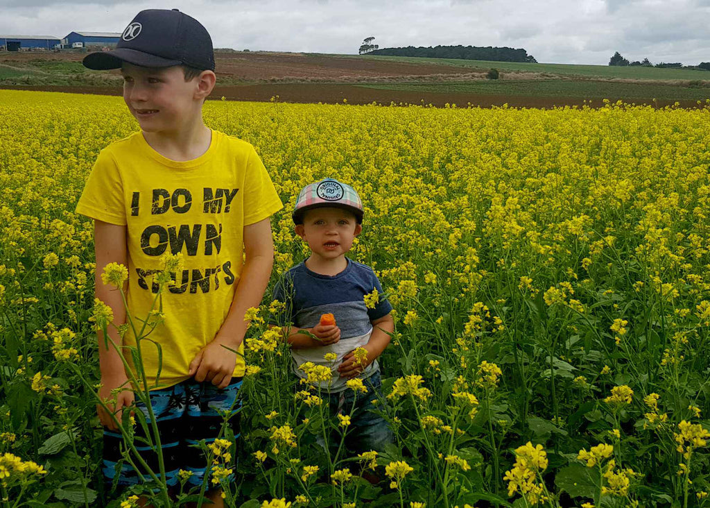 Children in Brassica Flowers